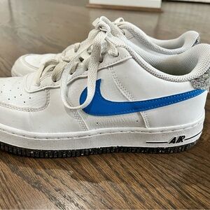 White Nike Air Sneakers with Blue Swoosh